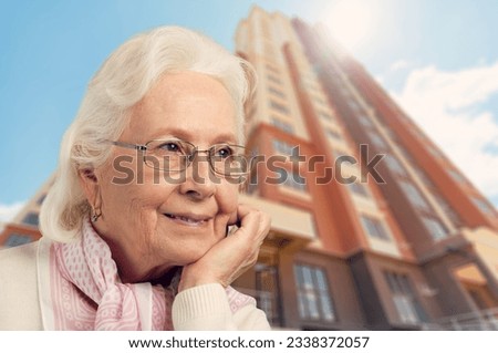 Outdoor portrait of beautiful old woman