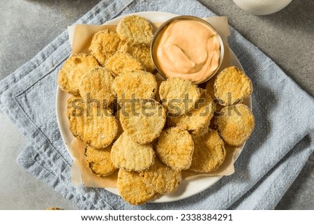 Homemade Deep Fried Pickles with Spicy Mayo Royalty-Free Stock Photo #2338384291