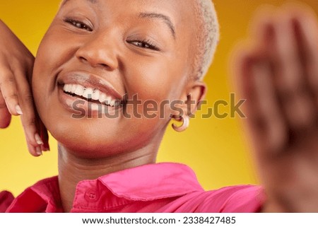 Selfie, smile and african girl with confidence or excited for social media in yellow background studio in closeup. Portrait, happy face and woman for video call, blog, photography or influencer.