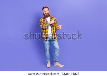 Full length photo of handsome satisfied man freelancer two arm direct empty space cool offer isolated on purple color background