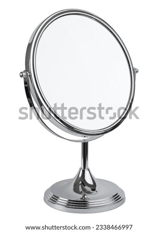 Round mirror for makeup. Magnifying mirror with 360° rotating. Cosmetic, cosmetology or makeup desk mirror. Silver metal stand magnify mirror for beauty salon. Woman skincare bathroom accessories Royalty-Free Stock Photo #2338466997
