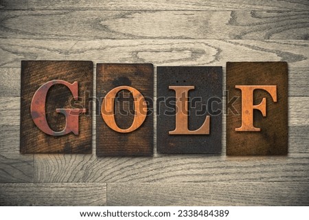 The word -GOLF- theme written in vintage, ink stained, wooden letterpress type on a wood grained background.