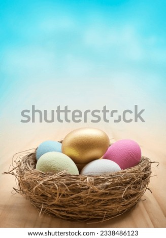 A collection of painted easter eggs in a nest. Easter background