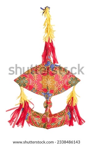 Malaysian traditional moon kite or Wau isolated on white background.