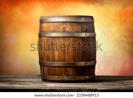 Wooden barrel on a yellow-red background