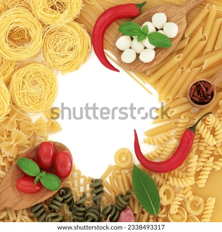 Mediterranean food ingredients with italian pasta selection forming an abstract border over white background.