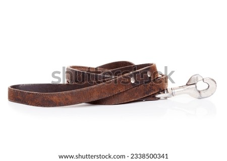 retro vintage old brown leather leash , isolated on white background