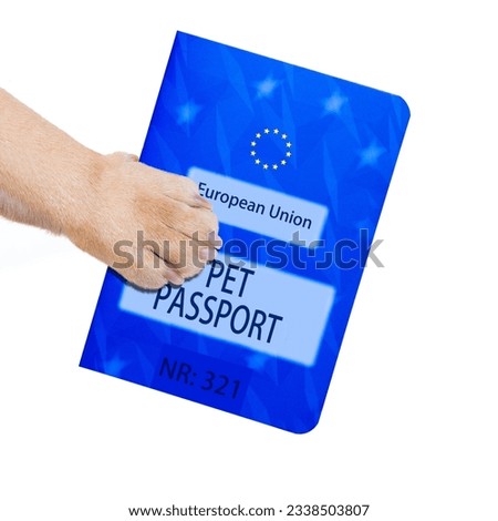 dog or pet holding its pet passport with paw , isolated on white background