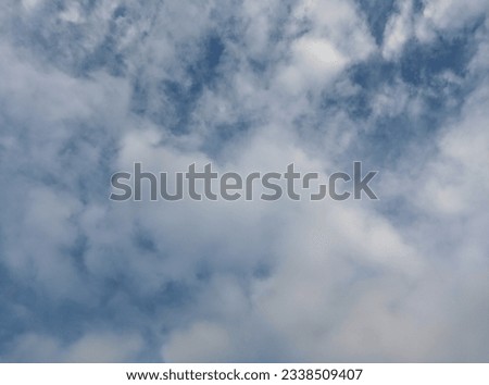 A view of the cloudy blue sky on a cool day
