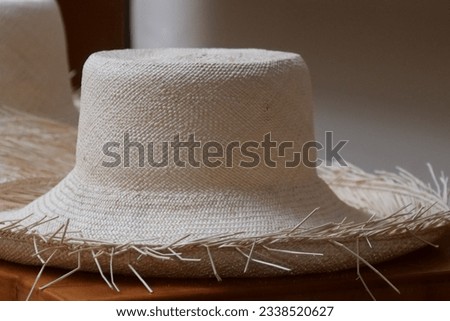 Unfinished woven panama hat after the ends are trimmed, hat making, Montecristi panama hat Royalty-Free Stock Photo #2338520627