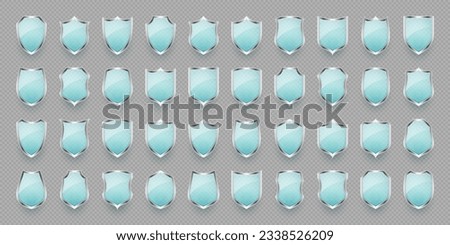 Set of vintage glass 3d shield icons. Blue heraldic shields. Black protection and security symbol, label. Vector illustration