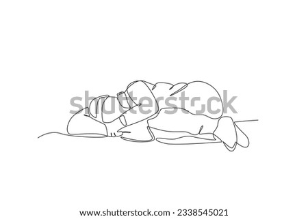 A homeless man sleeps curled up on the street. Homeless one-line drawing Royalty-Free Stock Photo #2338545021