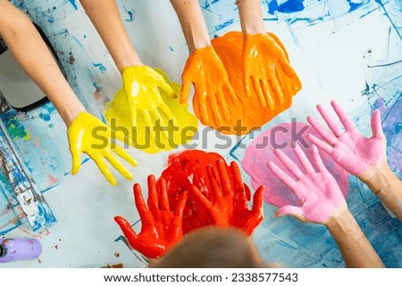 Group of Asian generation z people learning acrylic painting art by hand on canvas workshop at art studio. Young artist university student enjoy and fun creating colorful abstract modern art in class. Royalty-Free Stock Photo #2338577543