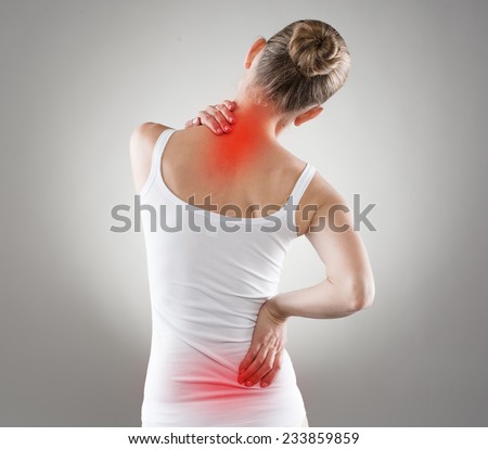 Spine osteoporosis. Scoliosis. Spinal cord problems on woman's back. Royalty-Free Stock Photo #233859859