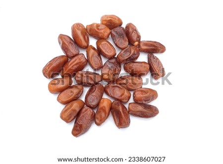 Heap of tasty dry dates or dates palm or palm phoenix dactylifera fruit isolate on a white backdrop.snack healthy,Arabic food,
tropical fruit Royalty-Free Stock Photo #2338607027