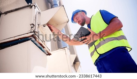 Commercial HVAC Air Conditioner Service By Electric Royalty-Free Stock Photo #2338617443