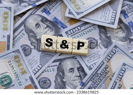The inscription SP 500, abbreviation of Standard and Poor's 500, in the United States, a stock market index that tracks 500 publicly traded domestic companies., The concept of profit from stock index Royalty-Free Stock Photo #2338619825