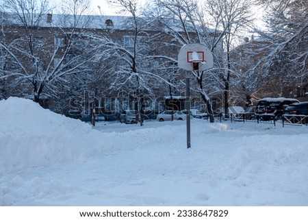 Basketball backboard шт snow covered yard