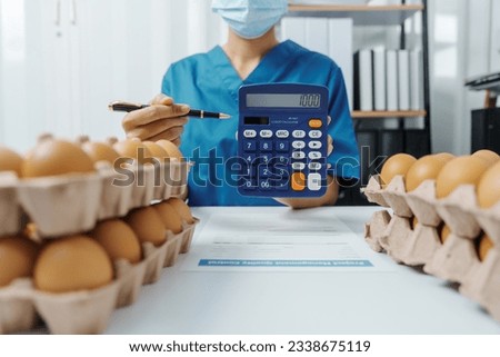 Lab test worker Quality control - Optimum Chicken Egg Quality, Practical Approach poultry eggs to accurately and consistently measure the quality of their produce.