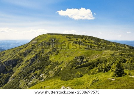 Mountain "Kotel", view from Harrachovy kameny in summer. Krkonose, Czech Republic. Royalty-Free Stock Photo #2338699573