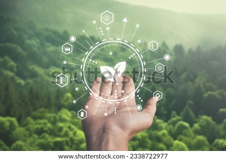 hand holding net zero target and carbon credit.CO2 emission reduction to stop global warming problem and reduce pollution into atmosphere from big industrial. Royalty-Free Stock Photo #2338722977