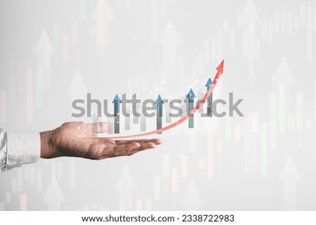 Businessman hand holding graph growth stock digital screen isolate on white background.economy trends,stock market,profit analyzing and business strategy concept.