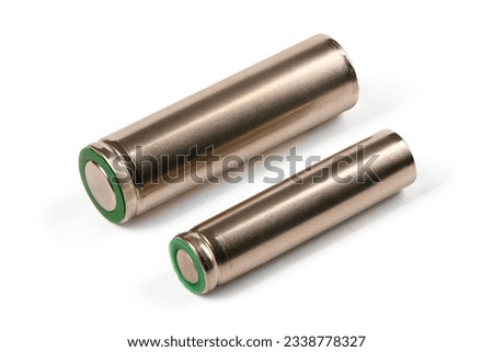 Two silver AA and AAA batteries isolated on white background. Extreme close-up. Side view. High resolution photo. Full depth of field. Royalty-Free Stock Photo #2338778327