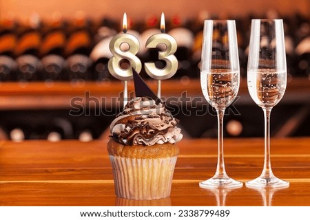 Cupcake With Number For Celebration Of Birthday Or Anniversary; Number 83.
