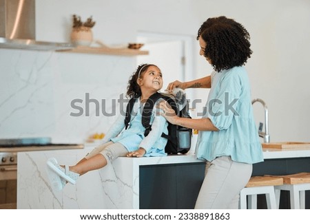 Mother, girl and packing bag for lunch, food and nutrition, wellness and development for morning school. African mom, lunchbox and backpack of child for healthy diet, care and happy in home kitchen