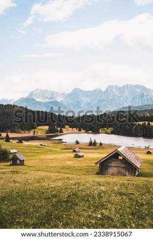 Lake Geroldsee, also Wagenbruchsee, With cabins Bavaria, Germany, Europe Royalty-Free Stock Photo #2338915067