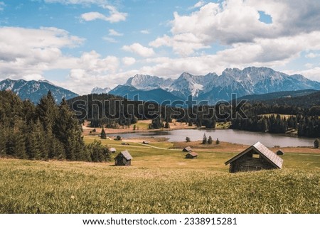 Lake Geroldsee, also Wagenbruchsee, With cabins Bavaria, Germany, Europe Royalty-Free Stock Photo #2338915281