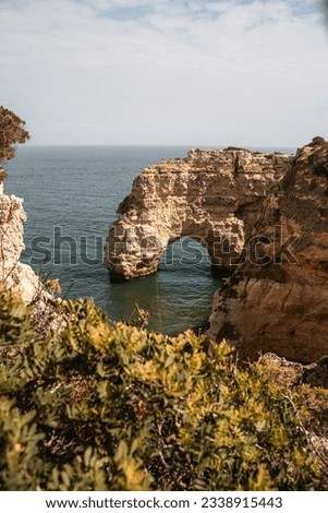 Viewpoint of the beach and Arch at Praia da Marinha, Algarve, Portugal 