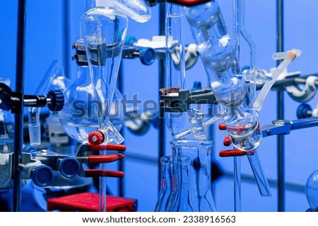 Decomposition Reaction: A single reactant breaks down into two or more simpler products. Royalty-Free Stock Photo #2338916563