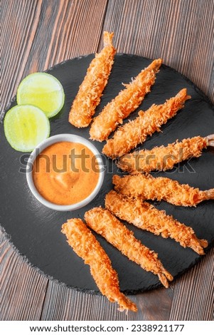 Shrimp tempura with sauce on the stone tray Royalty-Free Stock Photo #2338921177