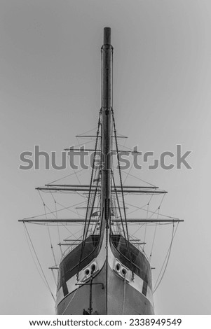  Black and white old sailing boat picture taken from underneath of the bow.
