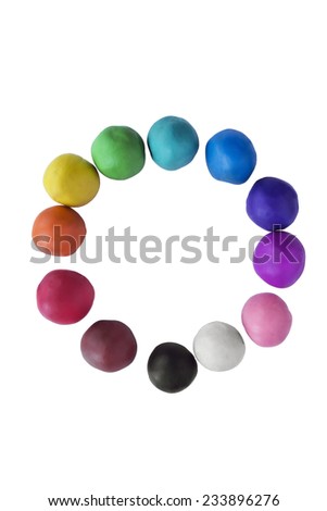 Circle of multicolor plasticine balls on white background