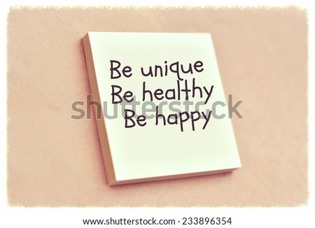 Text be unique be healthy be happy on the short note texture background