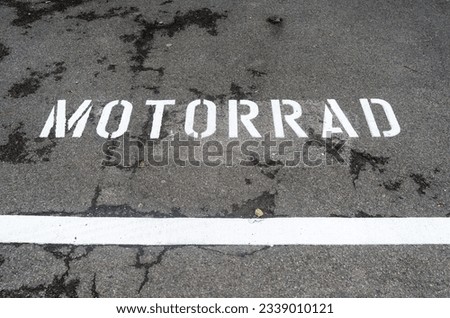 German inscription translated in English: Motorcycles