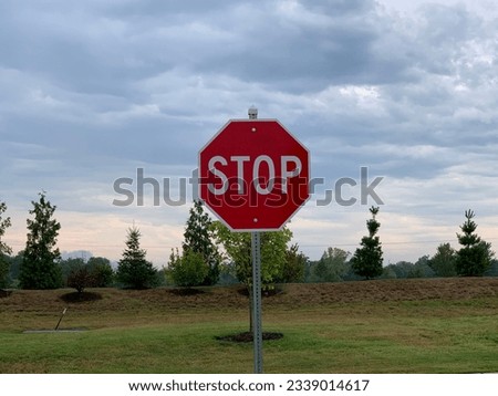 Stop sign with could cover background
