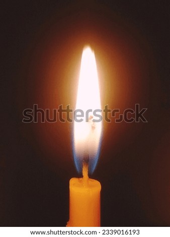 The candle flame that shines in the dark like a hidden fantasy