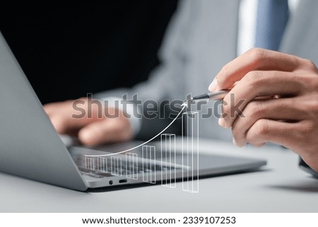 Businessman analyzing company future growth plan, business development for success. business incremental growth concept Royalty-Free Stock Photo #2339107253