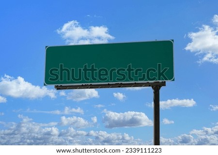 A Blank green highway sign with room to add your own text.