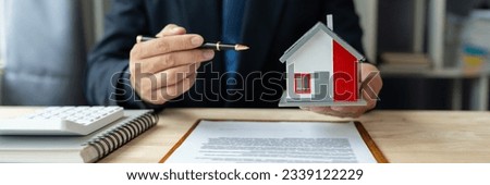 Businessmen, real estate brokers present model homes and advise clients on deciding to sign contracts. Buy and sell a house Offers for mortgage loans and home insurance.