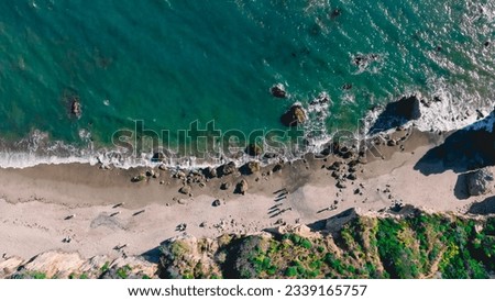 Matador beach and beautiful landscape with rocks and ocean against blue sky, California. An aerial shot of El Matador Beach in Malibu, California Royalty-Free Stock Photo #2339165757