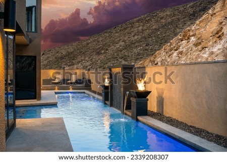 Custom Swimming Pool Design and Water Features Royalty-Free Stock Photo #2339208307