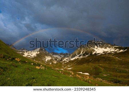 Rainbow over snowy mountains in Rize Turkiye