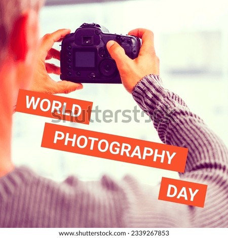 World photography day text on orange over caucasian man using camera. Global celebration of photography campaign, digitally generated image.