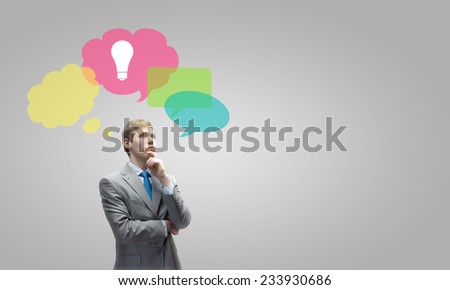Young businessman and colorful thoughts above her head
