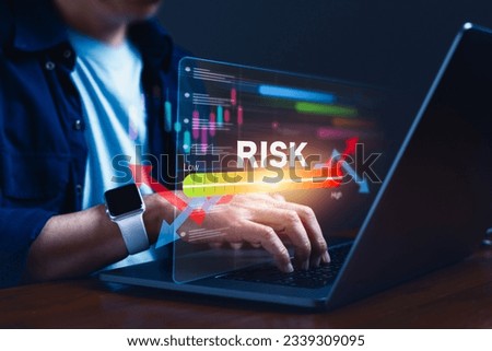 Strategic decision-making in the business, Businessman sits at his computer, engrossed intricacies of risk management, strategy, and analyzing financial data on a virtual screen Royalty-Free Stock Photo #2339309095