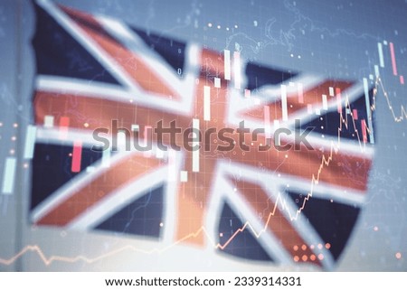 Multi exposure of virtual creative financial graph and world map on British flag and sunset sky background, forex and investment concept Royalty-Free Stock Photo #2339314331